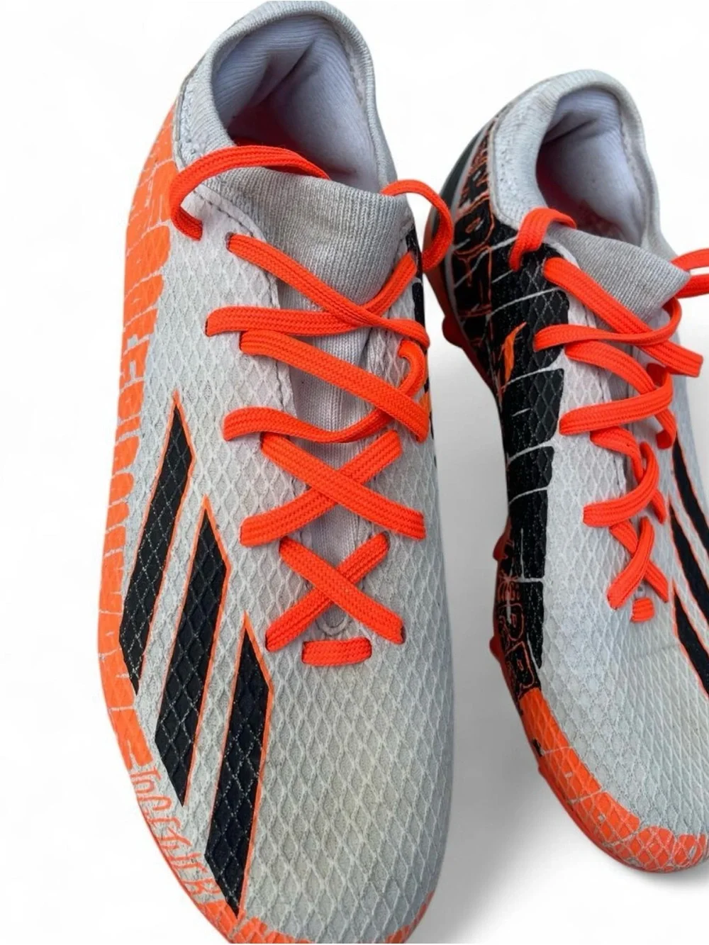 adidas Gray and Orange Soccer Cleats with Black Stripes